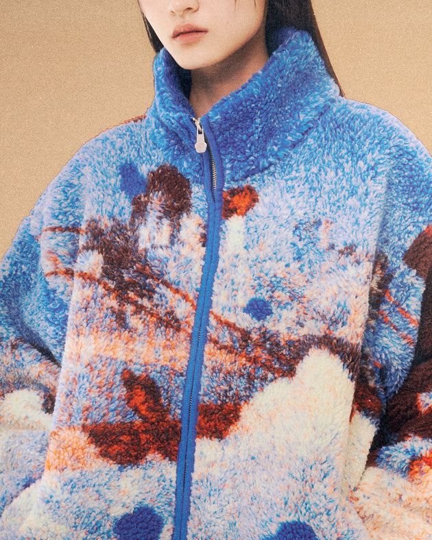 A model wearing Kloudy Bay Fleece against a brown background