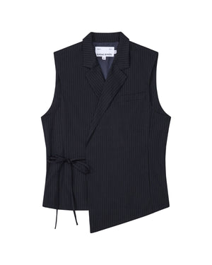 The SABRINA VEST by Sundae School is a sleeveless black pinstripe rayon blend vest featuring an asymmetric hem, side Korean goreum tie, lapel collar, and a single chest pocket, shown on a white background.
