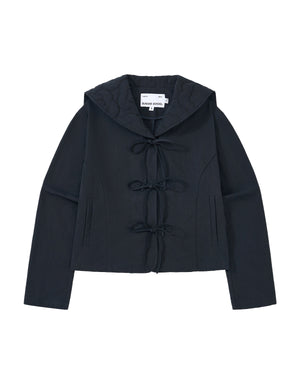 The NAVY SAILOR COLLAR UNIFORM JACKET by Sundae School is a black jacket featuring a quilted hood, long sleeves, two front pockets, and three bow tie closures down the front. Its design showcases floral quilted stitching inspired by classic Korean school uniform style.
