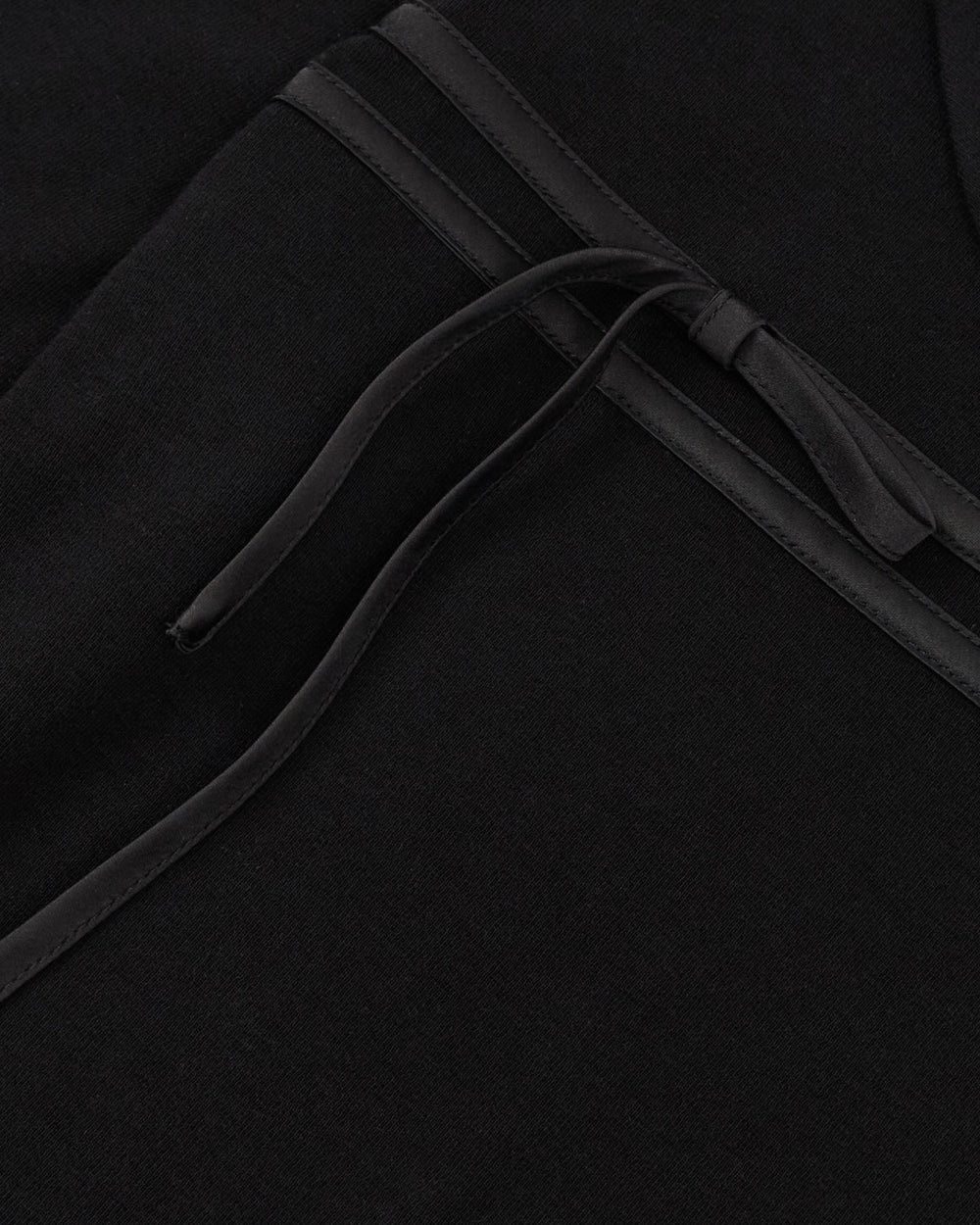BLACK SEONGSU KEYHOLE TOP: black long-sleeved blouse with a rounded collar and a keyhole neckline featuring satin ties.
