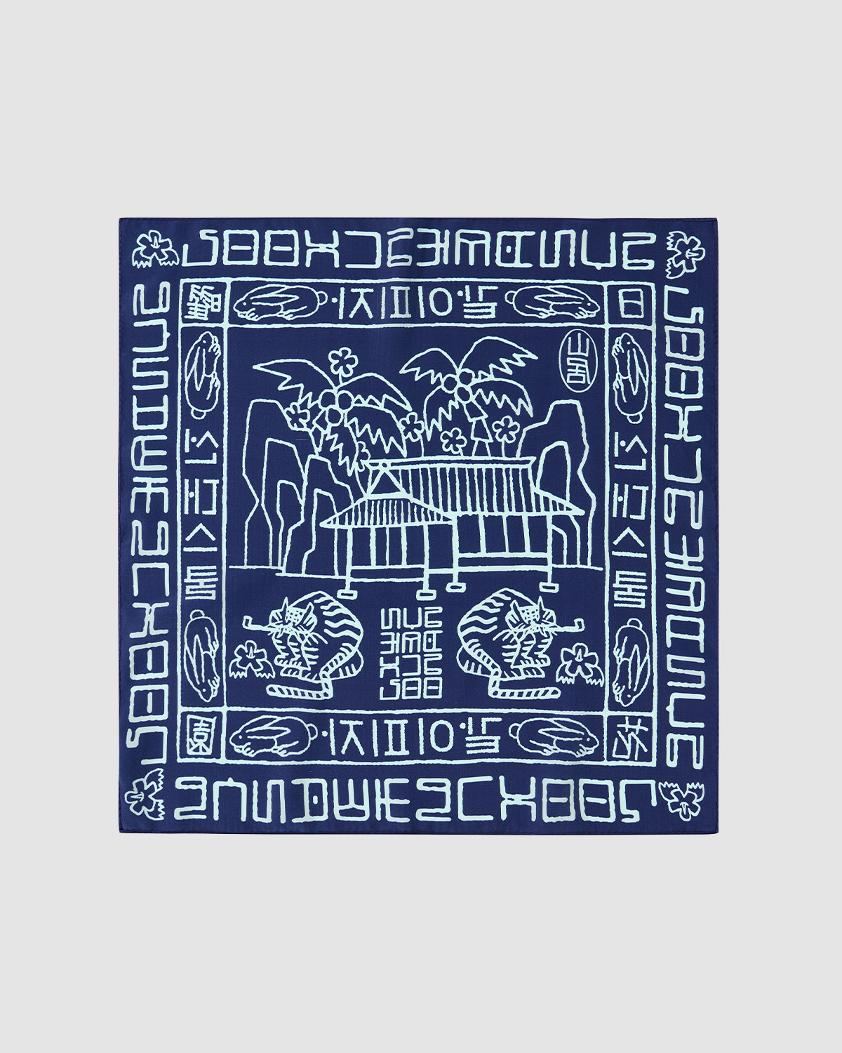 The Sundae School NAVY SILK BANDANA features white tiger, tree, rock, and geometric line art, plus stylized Hangeul and decorative borders inspired by Korean folk graphics on navy blue silk.
