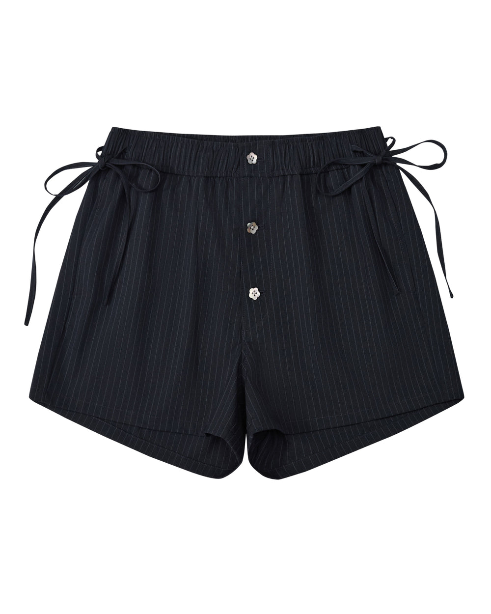 Sundae School’s STRIPED BOXER SHORTS feature classic black pinstripes, an elastic waistband, side ties, and three front buttons, all crafted from a lightweight rayon blend. Shown laid flat on a white background, these shorts are the ideal stylish and comfortable choice for working from home.