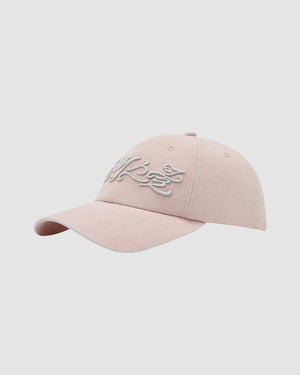 The BABY PINK DAENGGI CAP by Sundae School is a light pink adjustable cotton cap with a curved brim and white embroidered Hangeul hat design on the front, displayed against a plain light background.
