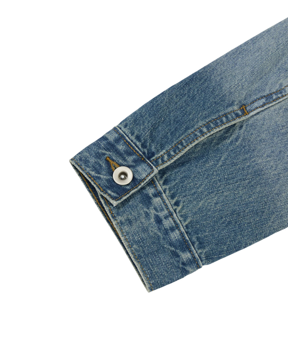 A close-up of the sleeve of the Sundae School MEDIUM BLUE TAEKWONDO DENIM JACKET showcases its metal snap button and contrasting yellow stitching detail against a white background—an ideal representation of Korean Canadian tuxedo style.