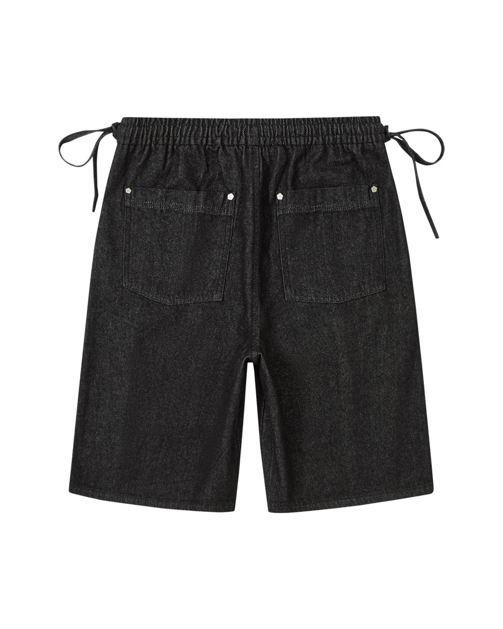 Back view of the BLACK VITA JORTS by Sundae School featuring black pleated denim, an elastic waistband, two back pockets with rivet details, a wide-leg silhouette, and adjustable side ties.