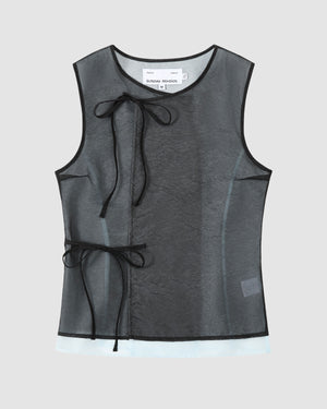The BLACK VITA ORGANZA VEST by Sundae School is a sleeveless sheer black mesh top with black trim and Korean goreum ties at neck and side. A white label is visible at the neck. Displayed on a plain light gray background.