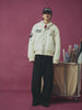A male model showing different parts of SUNDAE SCHOOL IVORY VARSITY JACKET wearing Sundae School Indigo Daenggi Cap